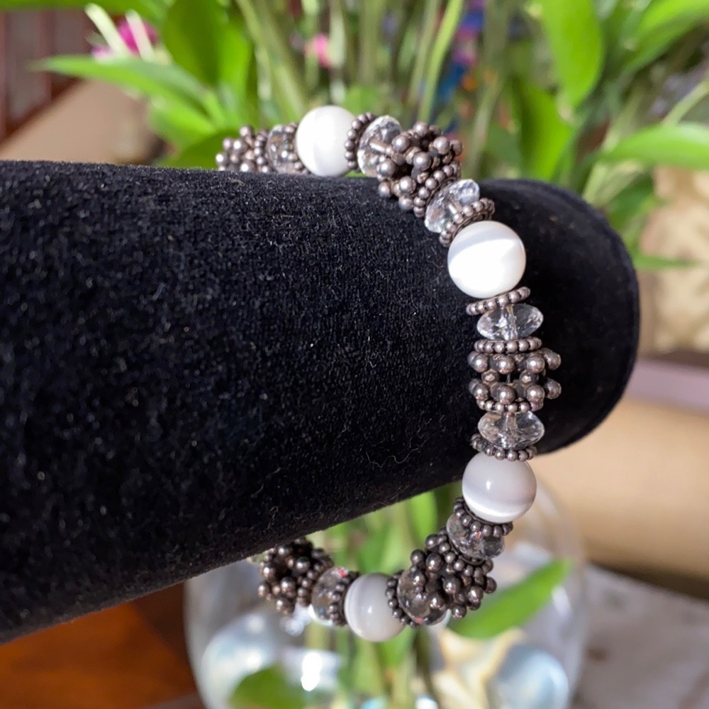 Silver, crystal , and stone bracelet.